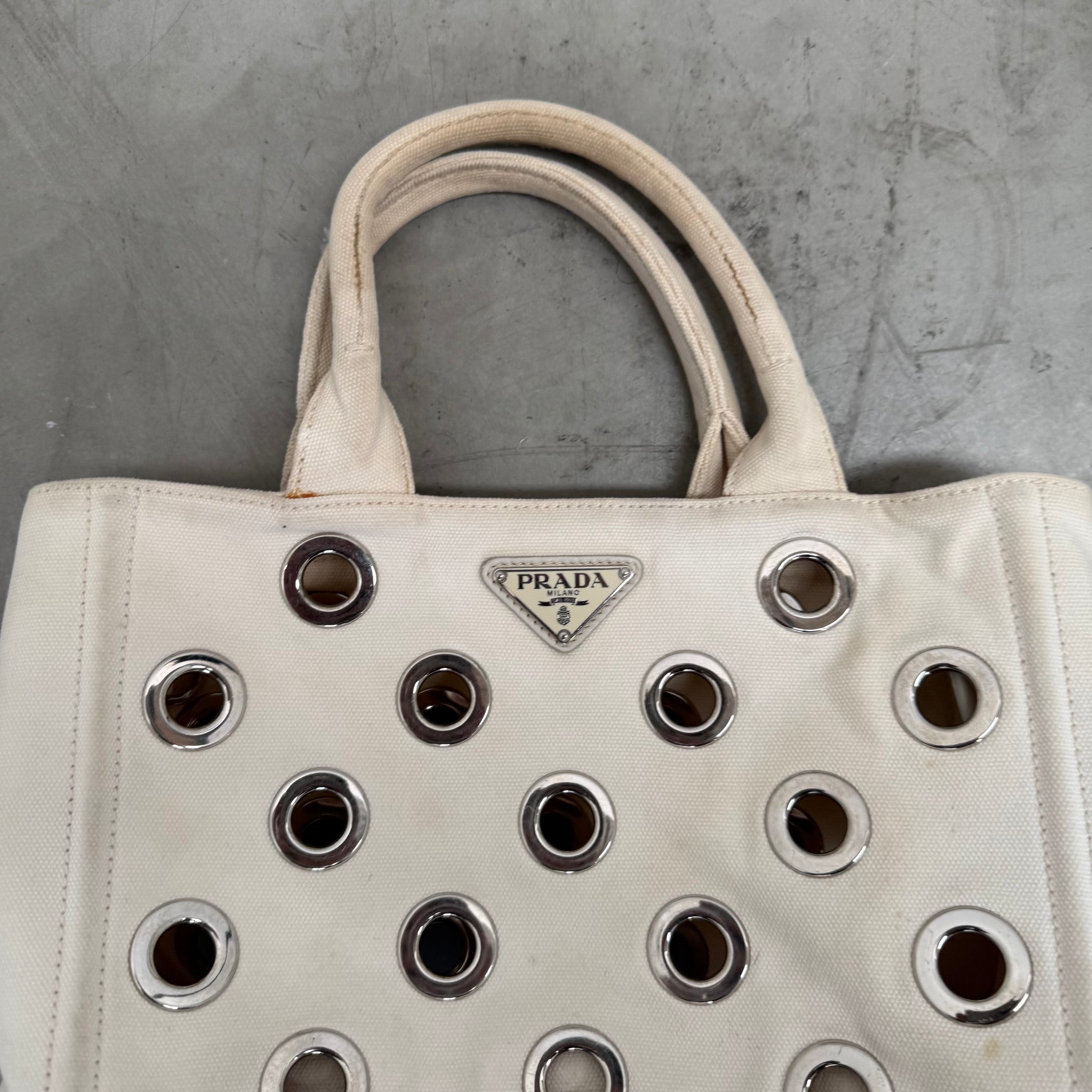 Prada White Canapa Grommet Embellished Canvas Canapa Tote Bag