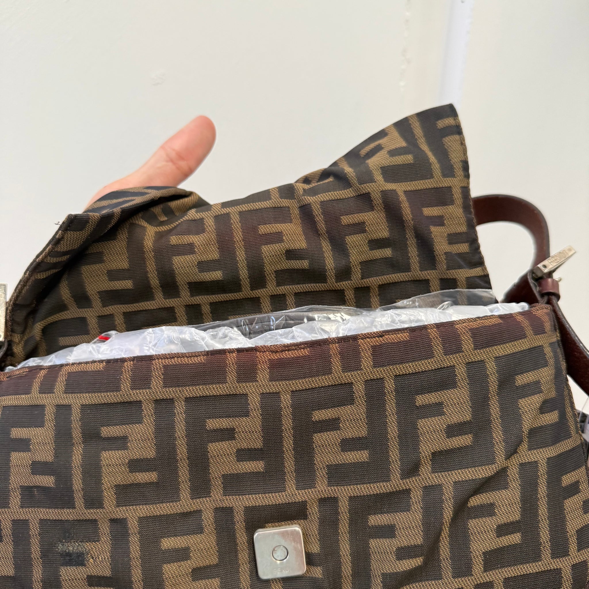 Fendi Zucca Print Baguette Bag with Pink Buckle