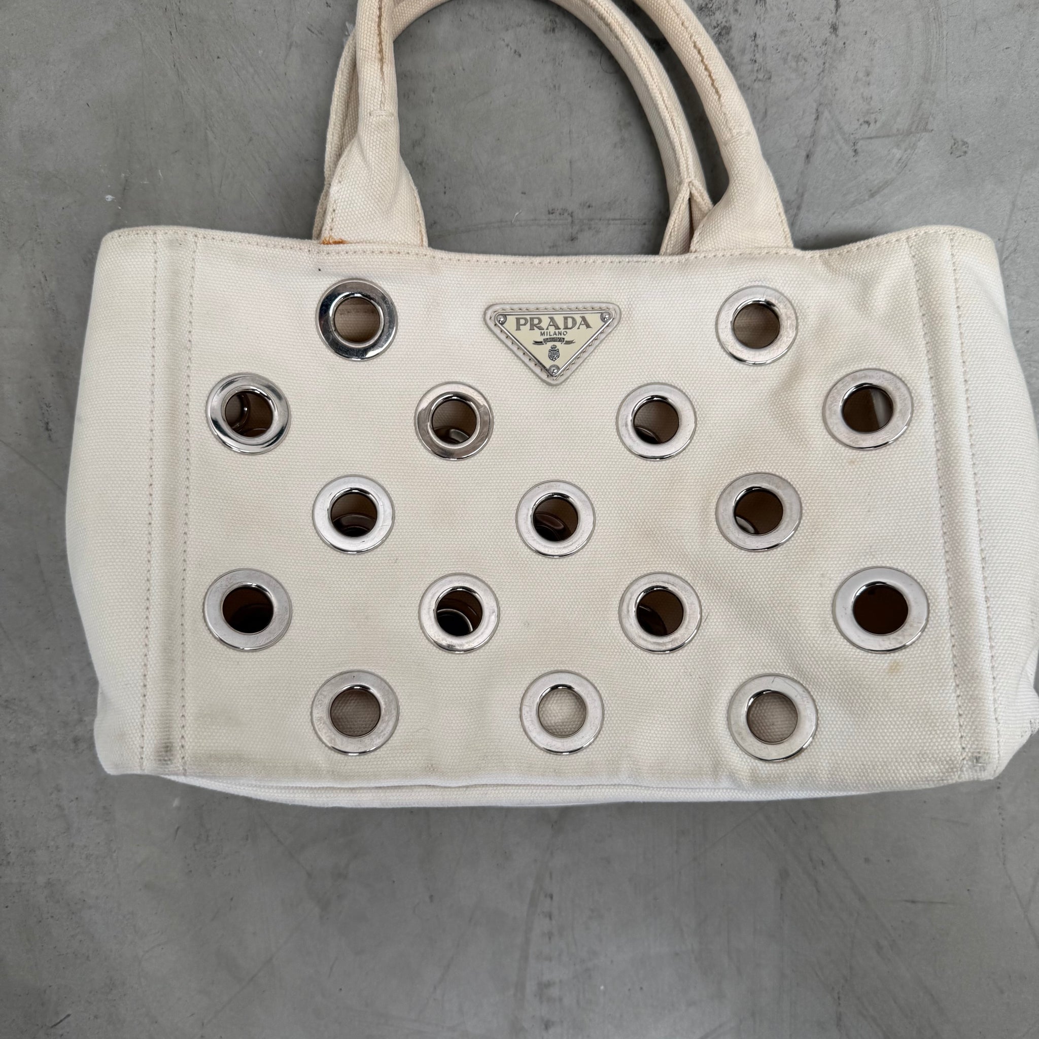 Prada White Canapa Grommet Embellished Canvas Canapa Tote Bag