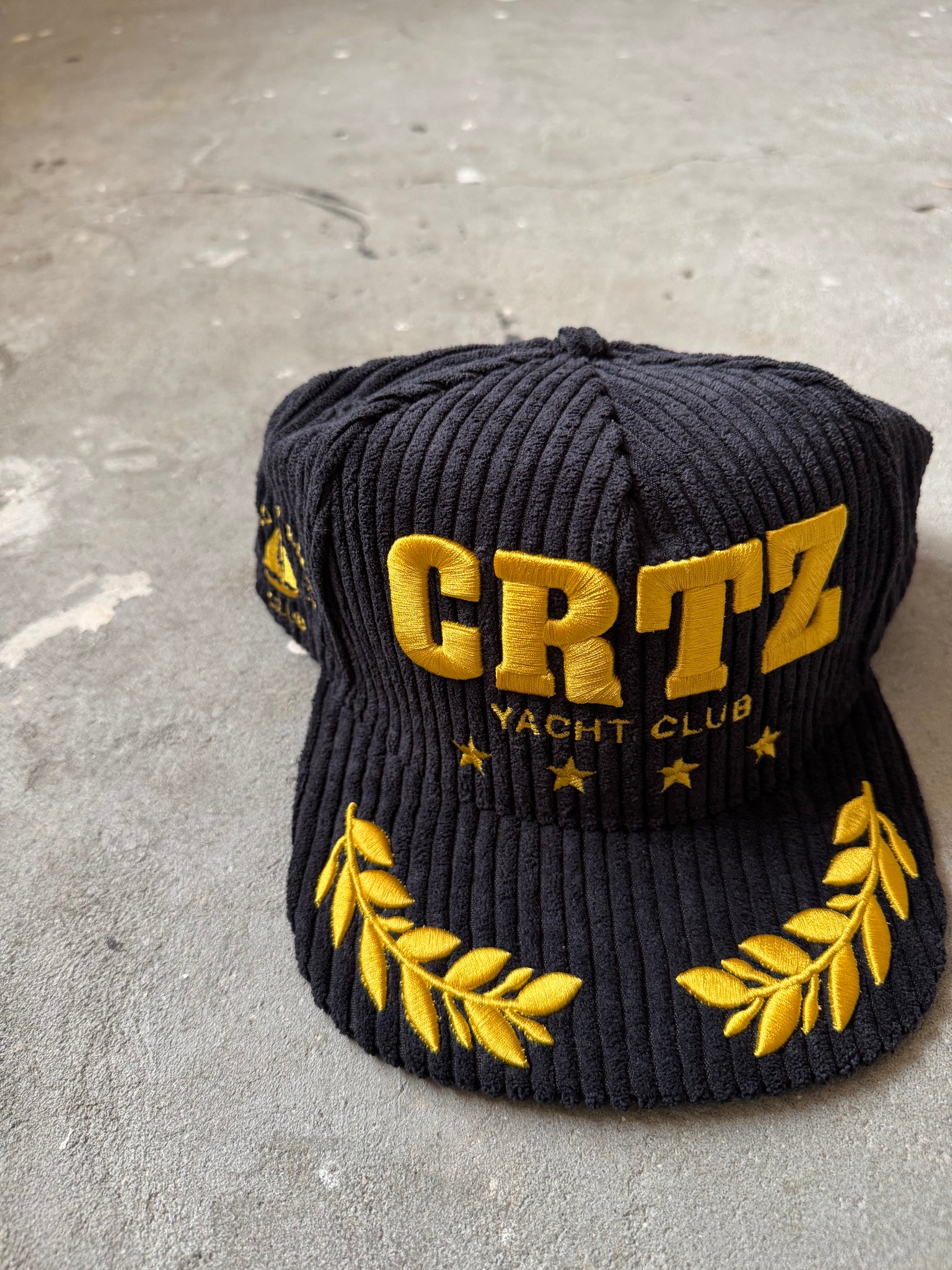 Corteiz Soho Yacht Club Cap Black/Gold