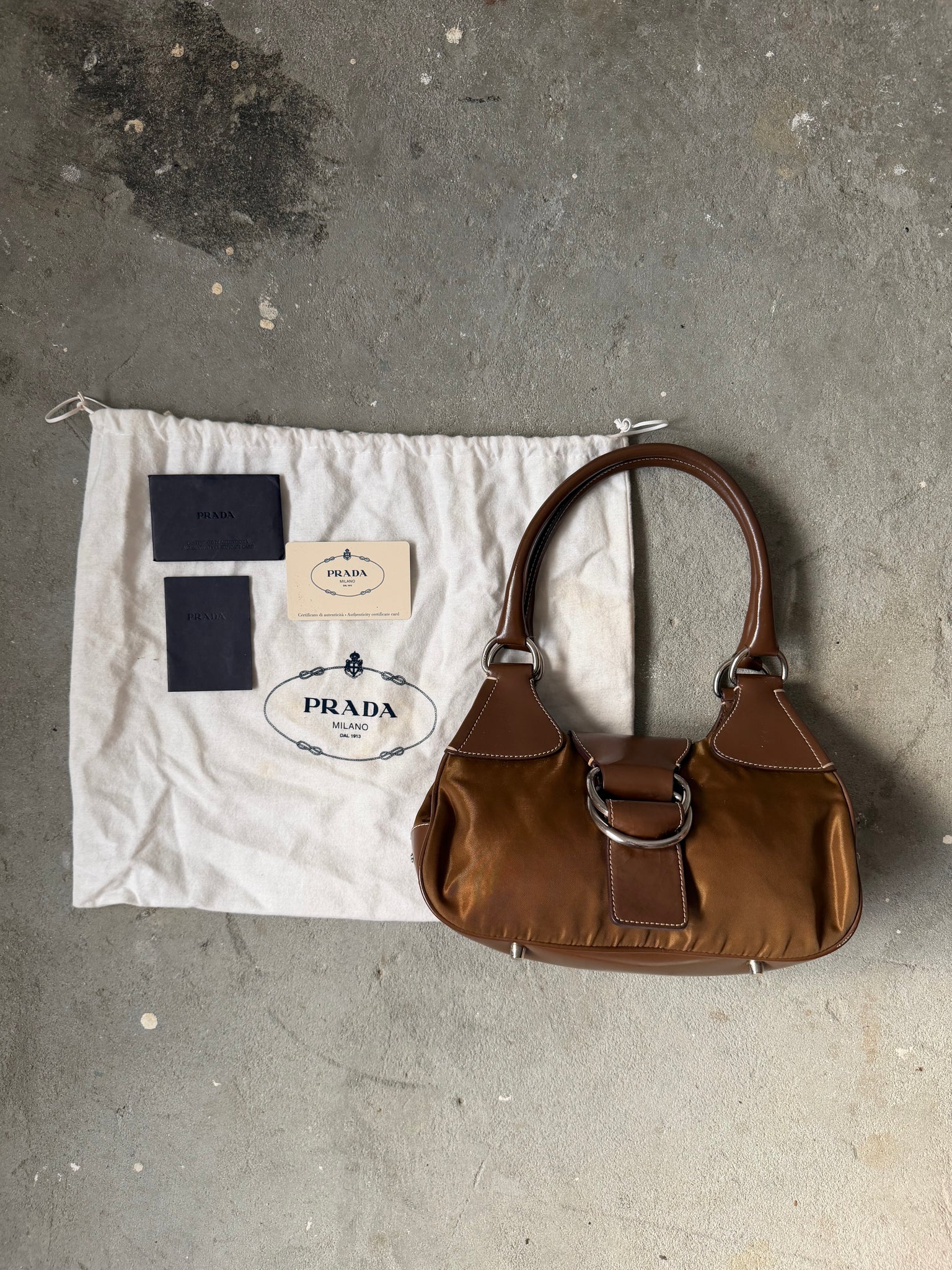 Prada Enamelled Moon Shoulder Bag Brown