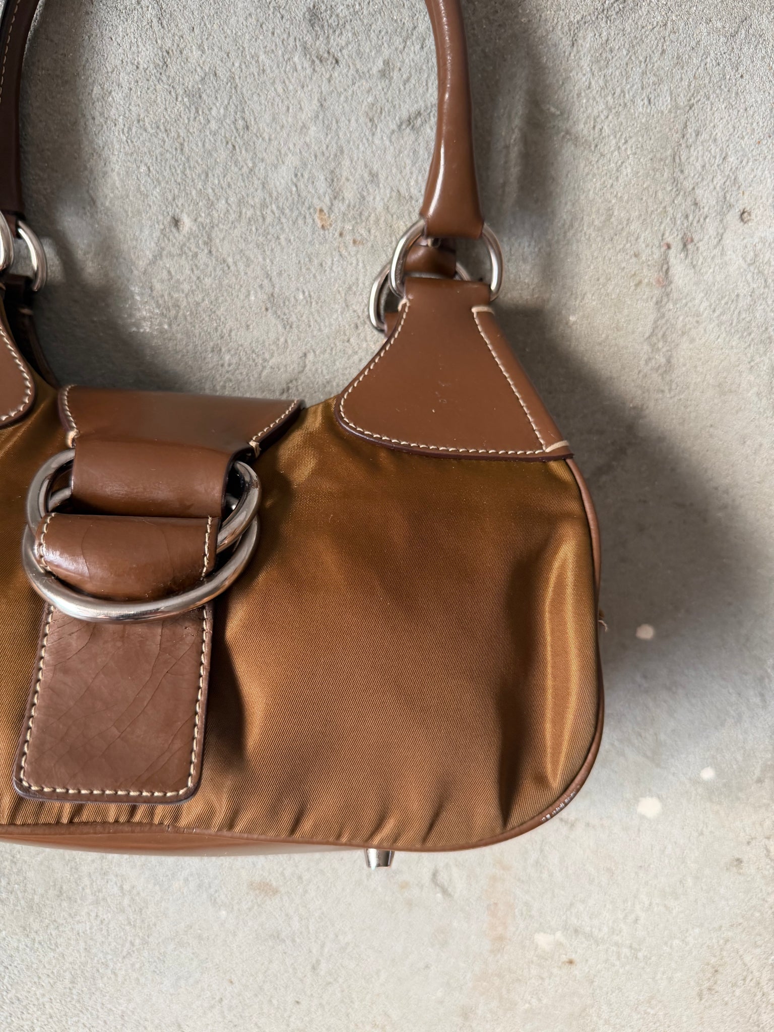 Prada Enamelled Moon Shoulder Bag Brown