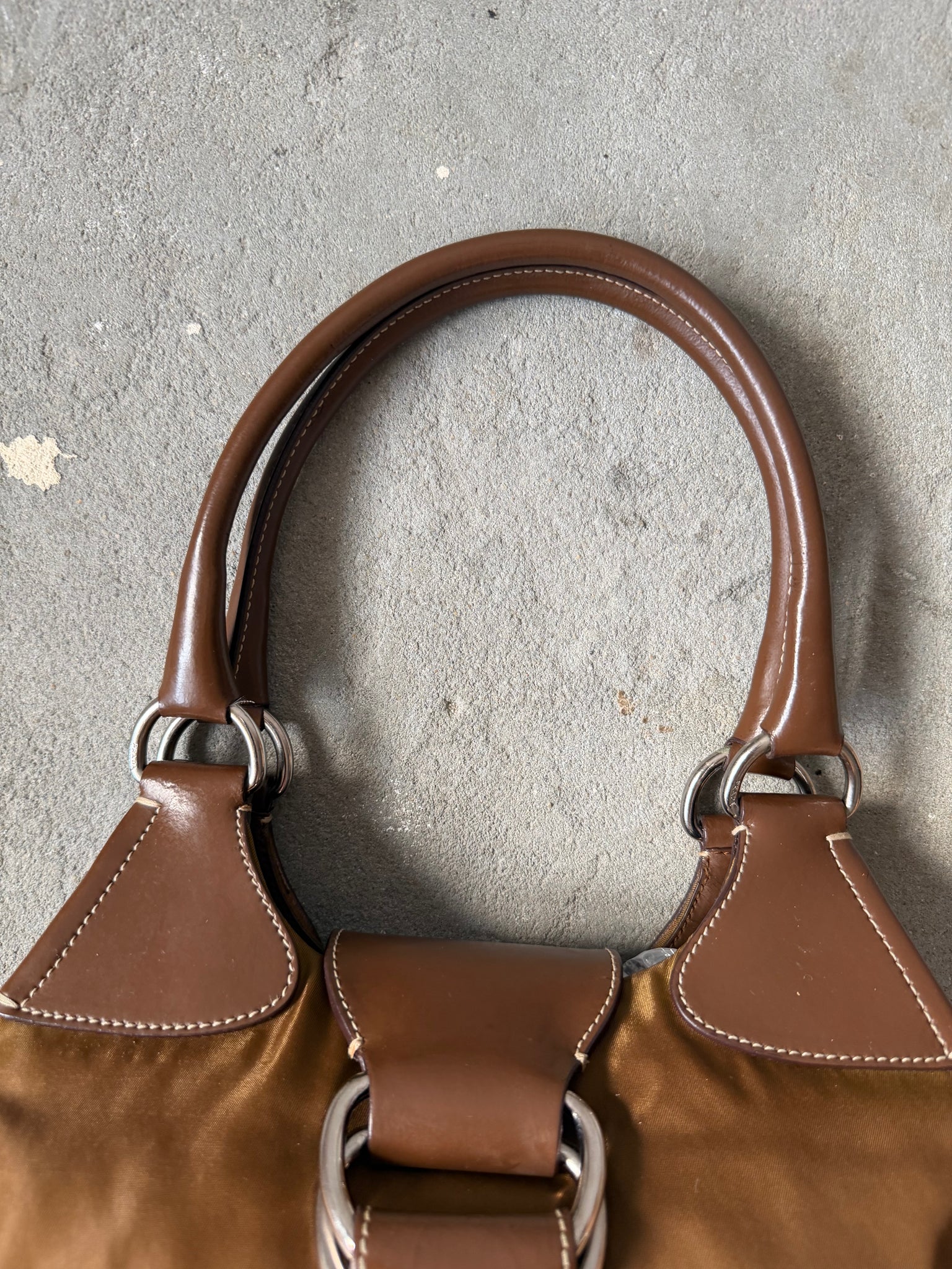 Prada Enamelled Moon Shoulder Bag Brown