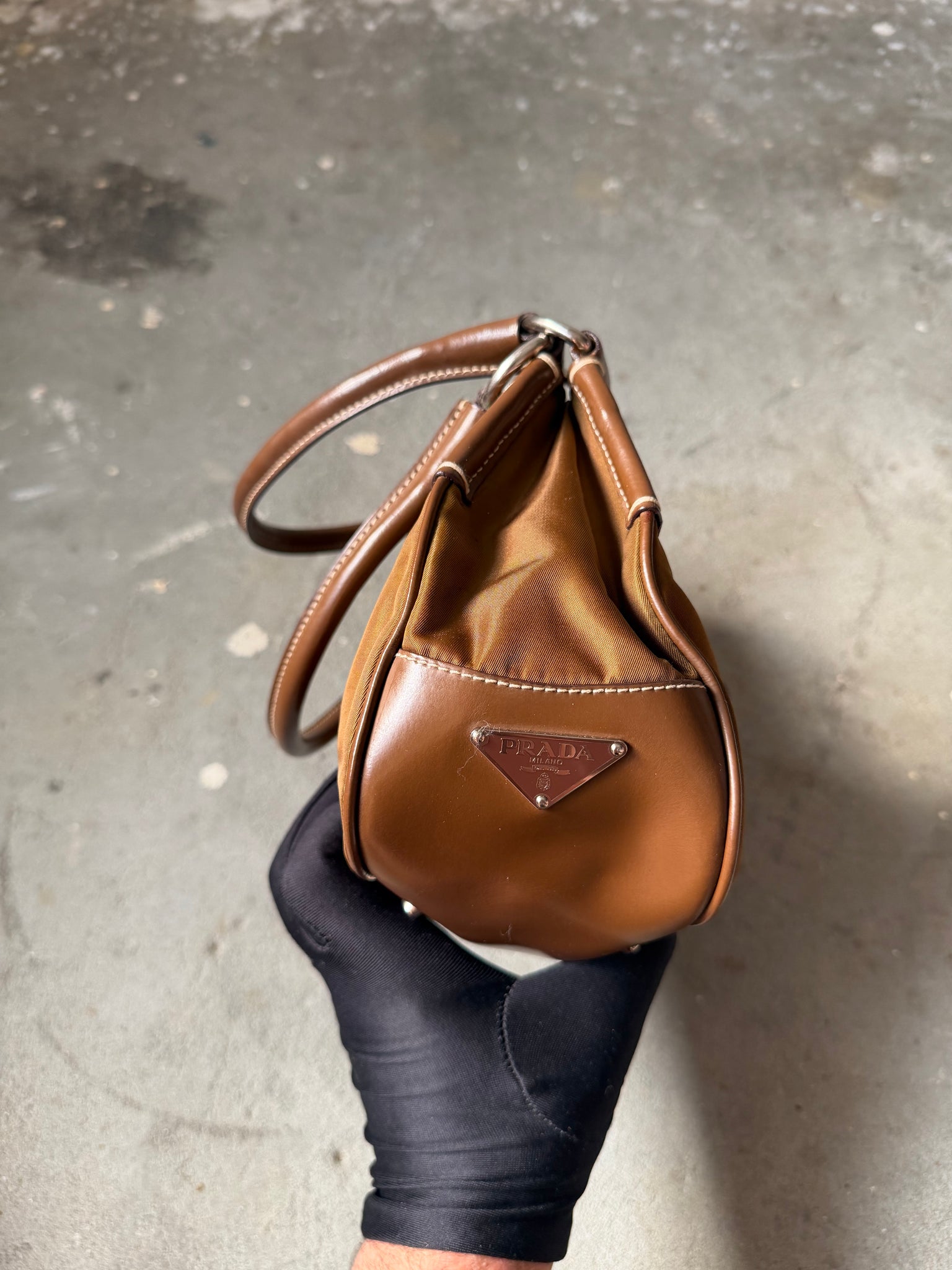 Prada Enamelled Moon Shoulder Bag Brown