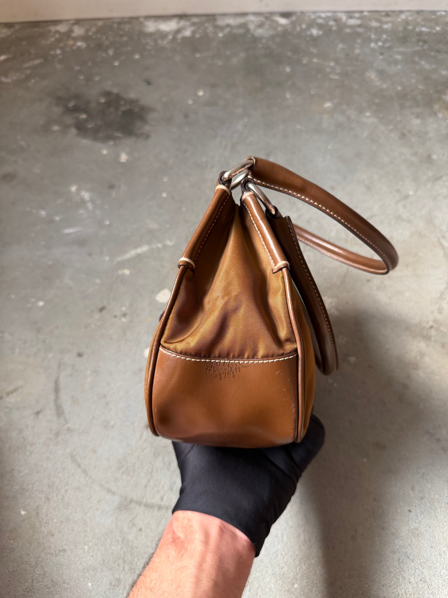 Prada Enamelled Moon Shoulder Bag Brown