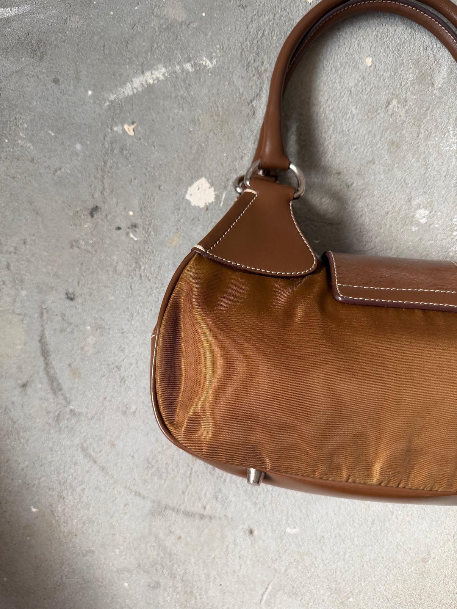 Prada Enamelled Moon Shoulder Bag Brown