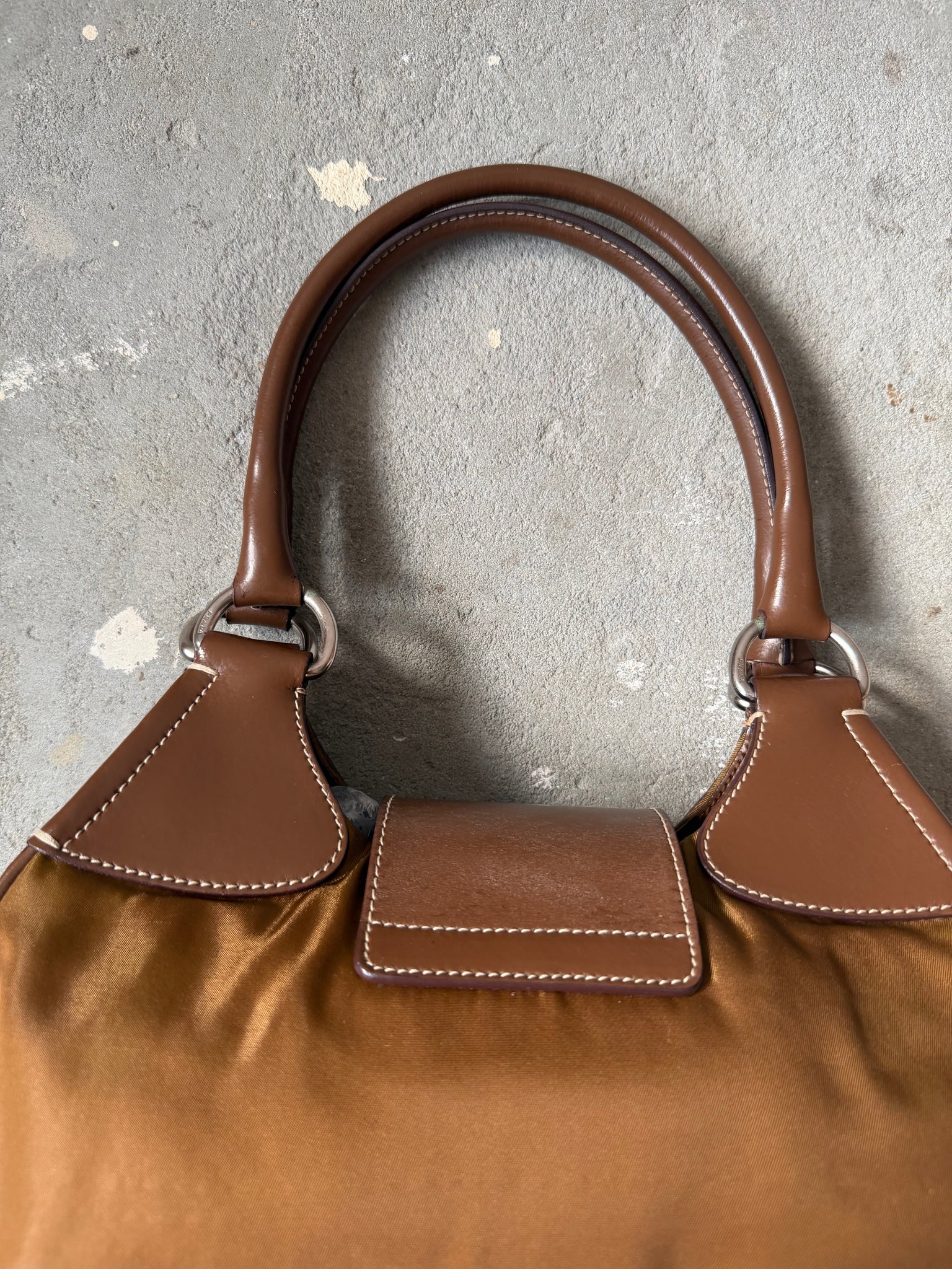 Prada Enamelled Moon Shoulder Bag Brown