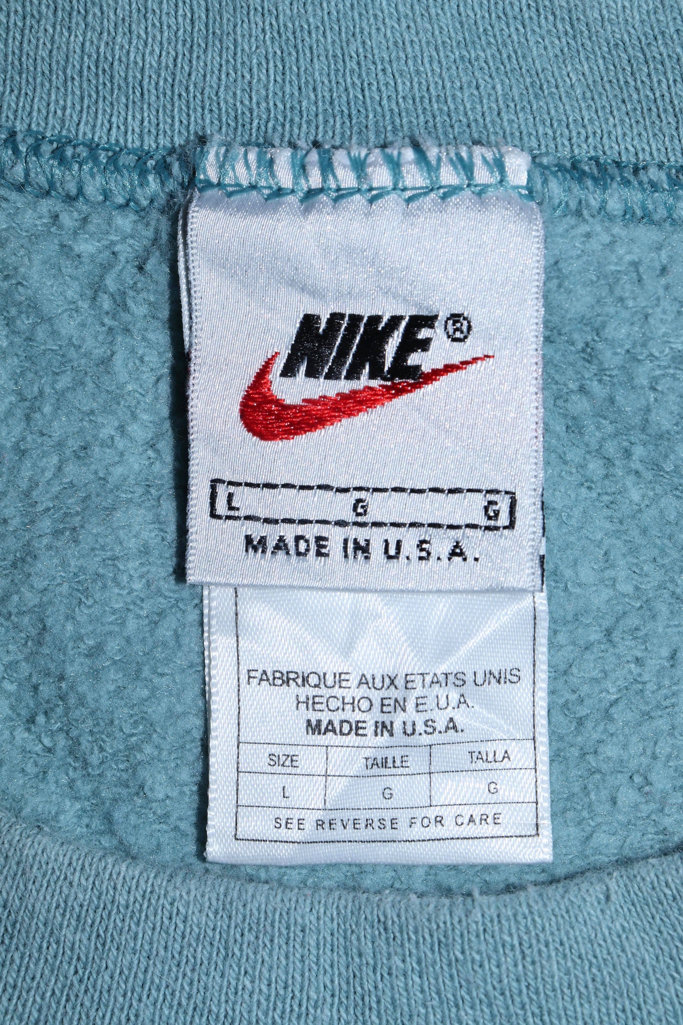 Vintage 90s Nike Embroidered Mini Swoosh Ice Blue Sweatshirt